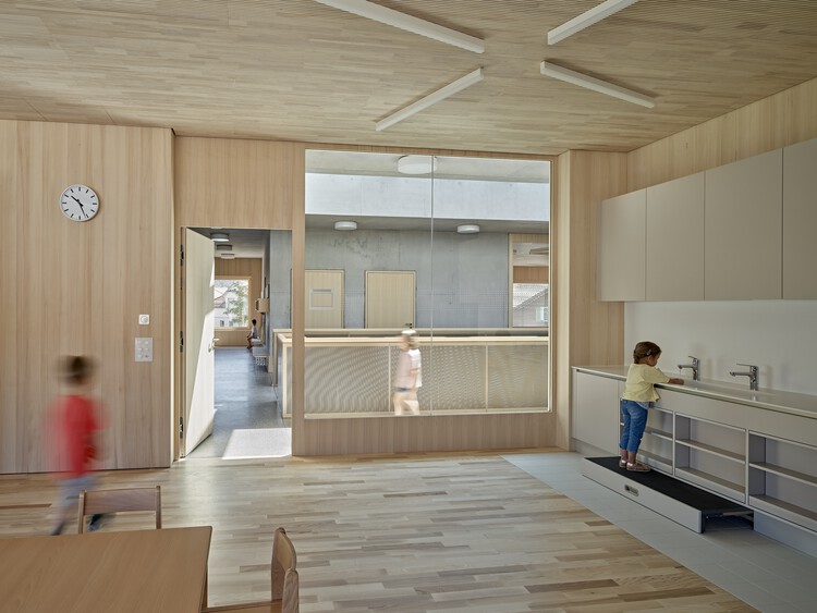 مدرسه ابتدایی بوتشویل / Illiz Architektur - عکاسی داخلی، آشپزخانه، پرتو